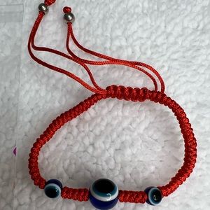 red thread bracelet is new it is in its packaging as it comes in the photo